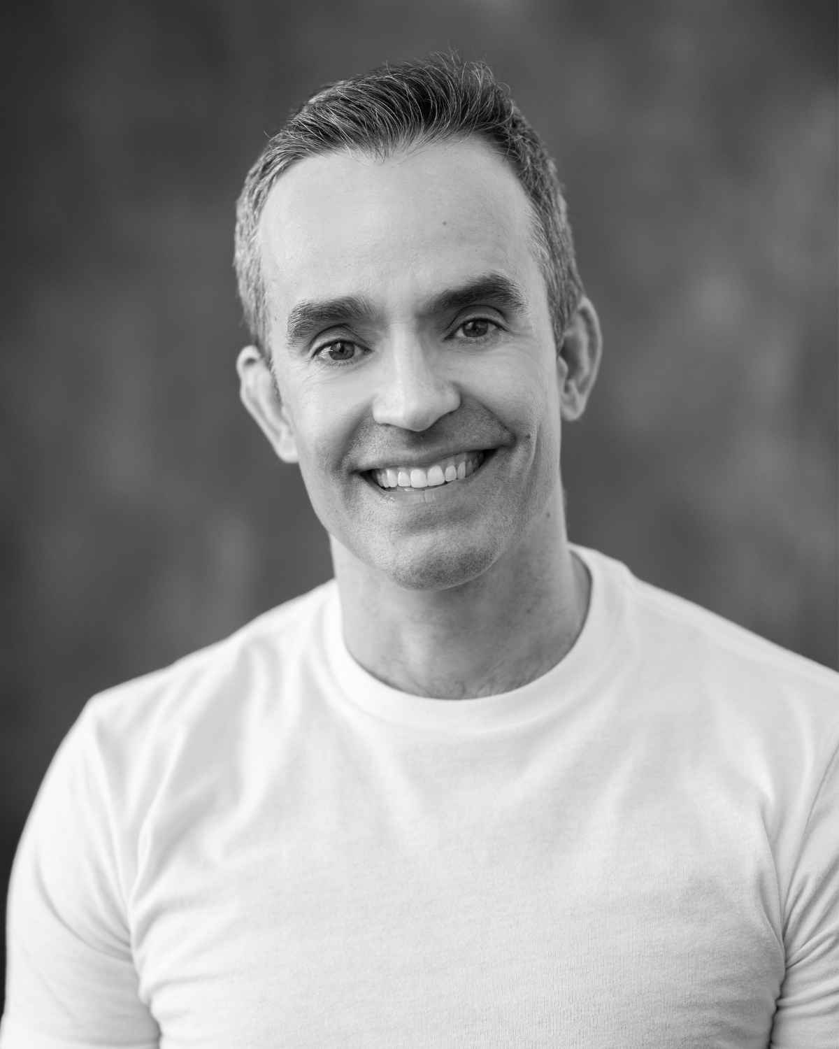 Aaron S. Watkin Headshot in Black and White. Photography by ASH