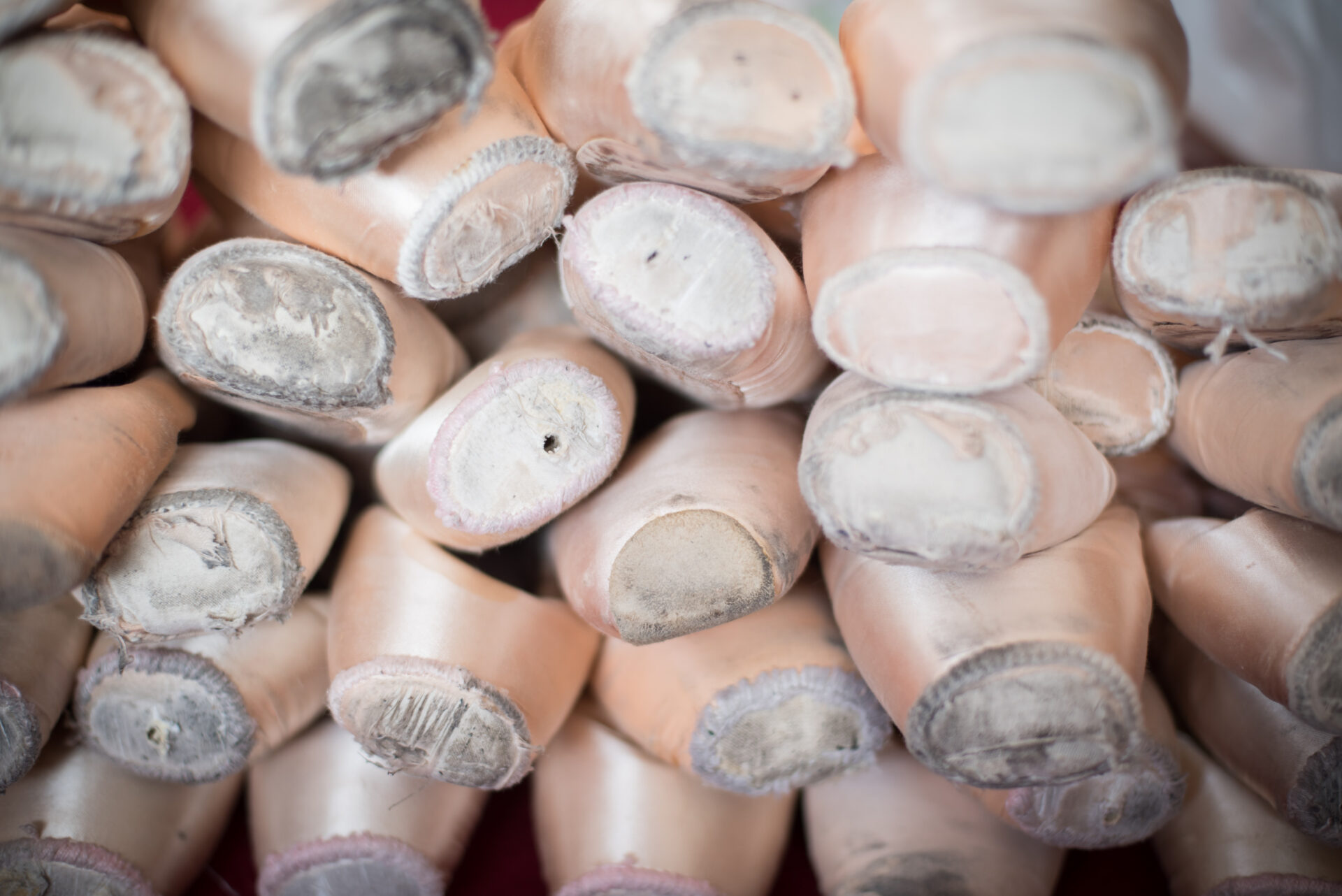 Pointe shoes worn by English National Ballet dancers are collected to be repurposed into our pointe shoe tree (c) ASH