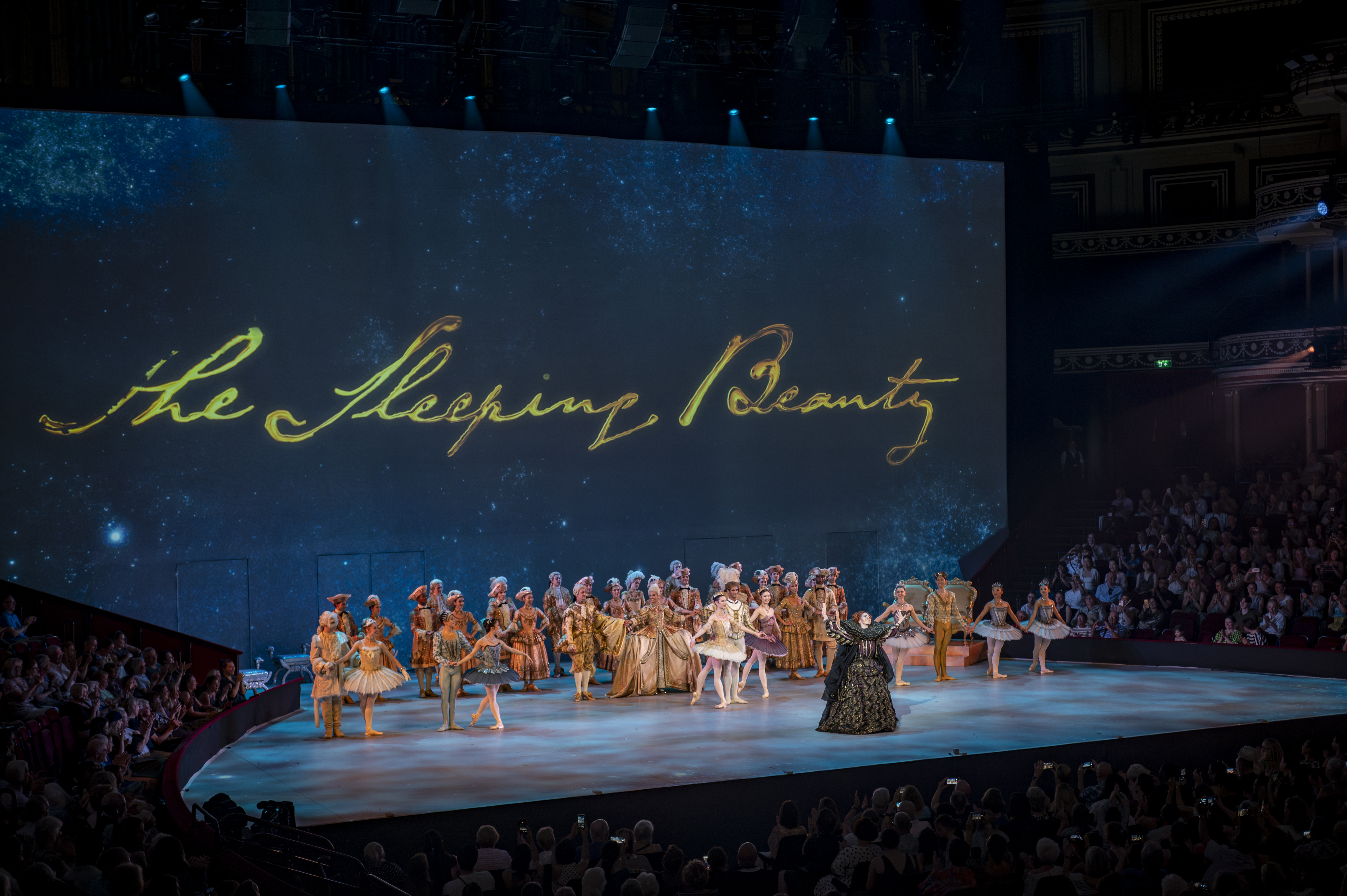 English National Ballet dancers on stage in Sir Kenneth MacMillans The Sleeping Beauty at the Royal Albert Hall